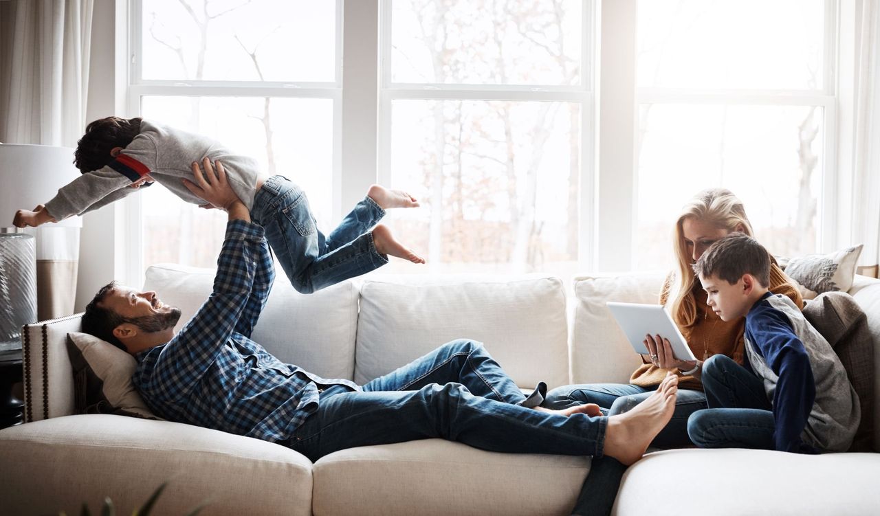 A family relaxing together in a comfortable living room
