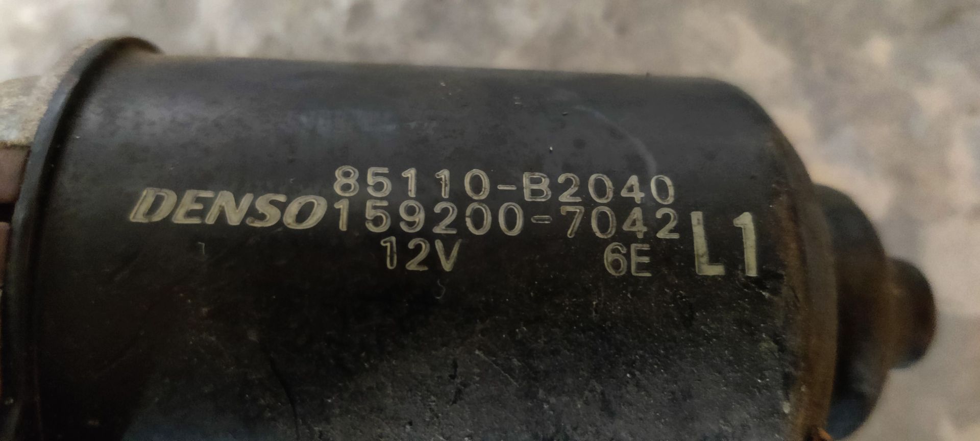 Ruitenwissermotor van een Daihatsu Cuore bij Stegeman Car Parts
