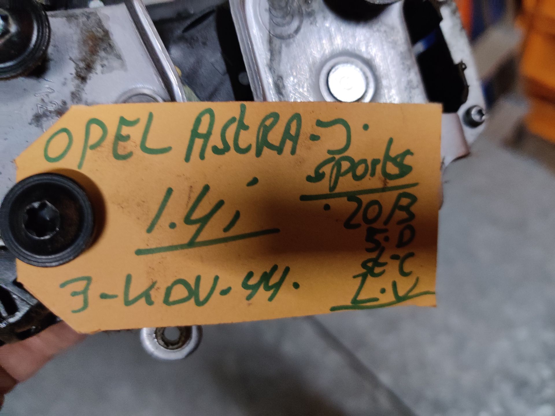 Opel Astra J station slotvanger, slotplaat linksvoor.