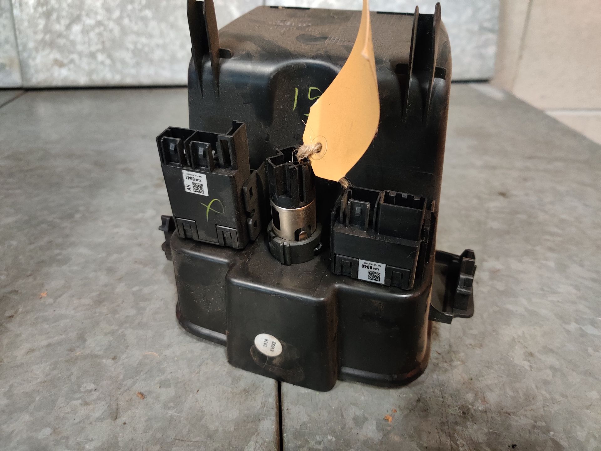 Opel Astra J, opbergvakje met 12 volt aansluiting
