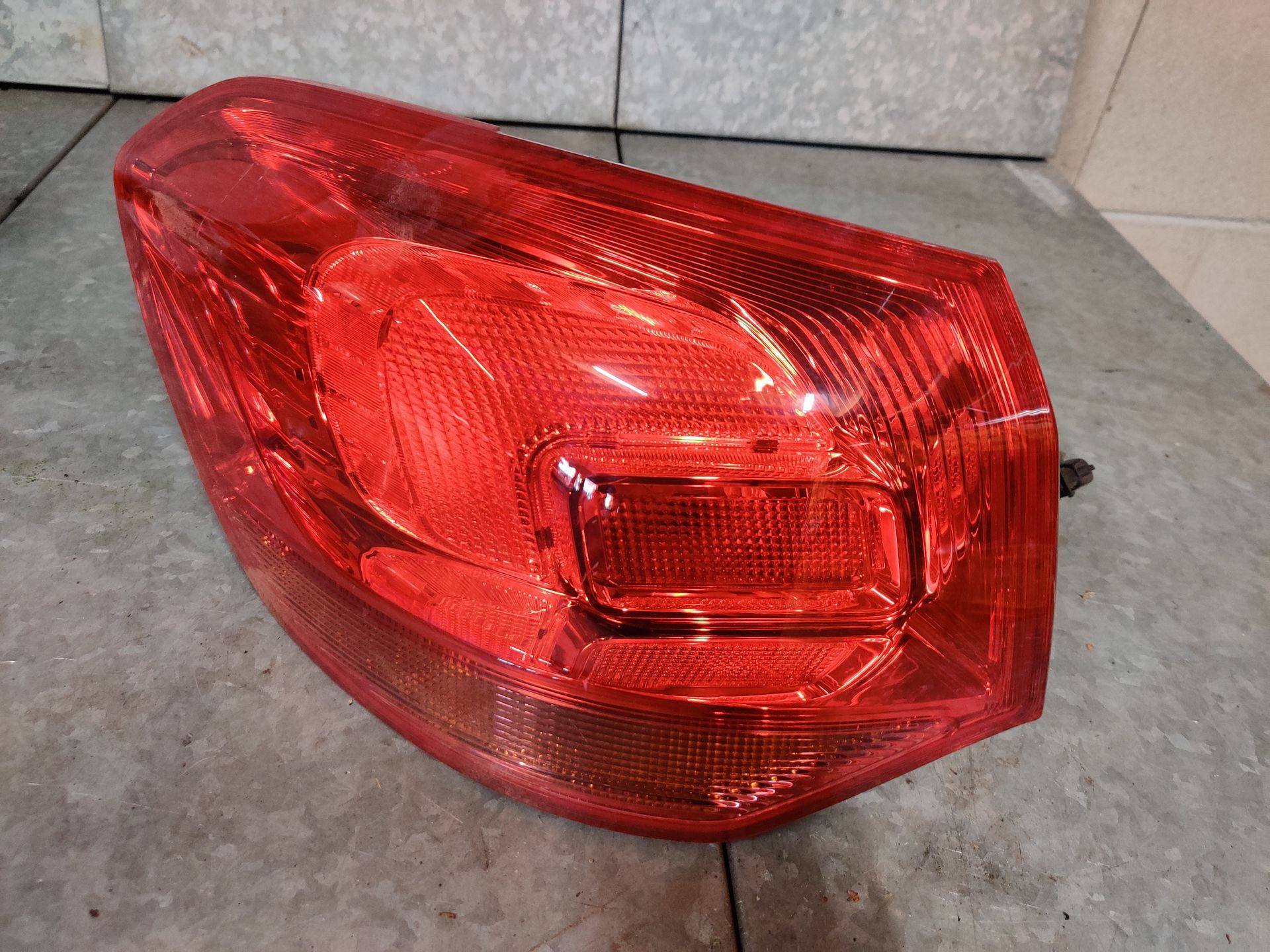 Opel Astra J linker achterlicht van een 1.4i sports, station uit 2013, gebruikt.