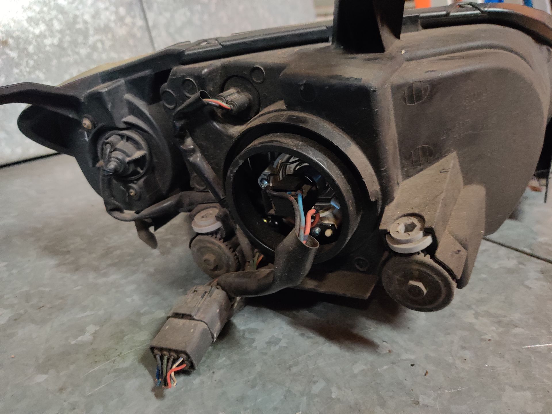 Mazda 2 linker koplamp uit 2006
