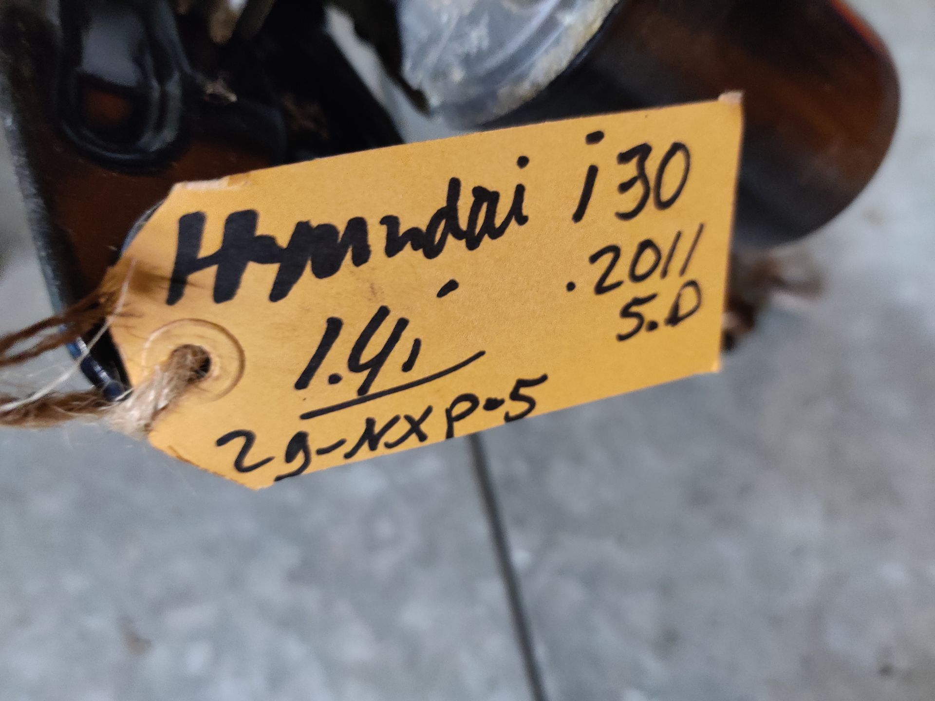 Hyundai i30, ruitenwissermotor met stangen uit 2011, gebruikt.