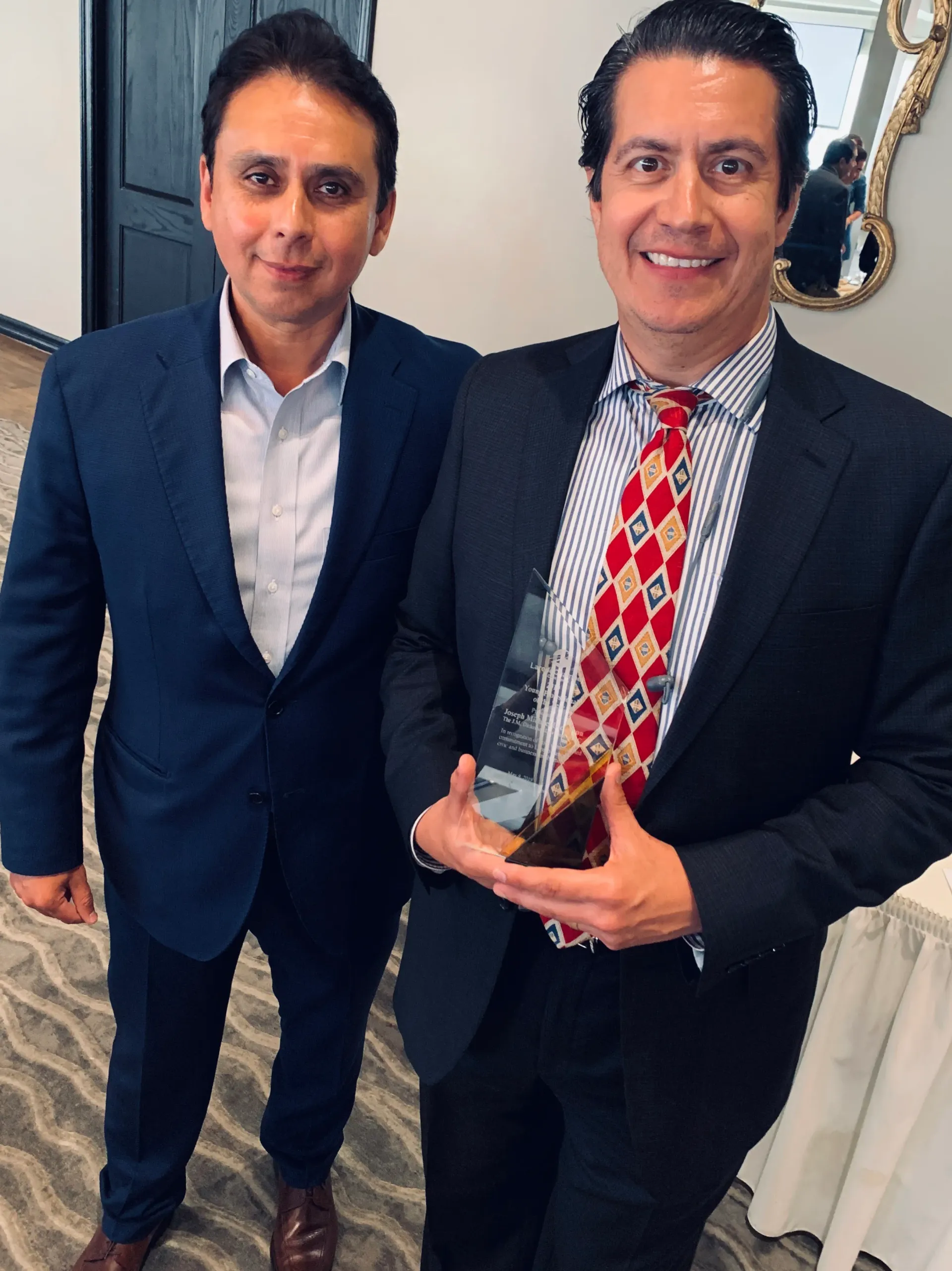 Two happy men | Laredo, TX | The J.M. Dickerson Law Firm PLLC