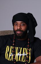 A man wearing a black shirt
