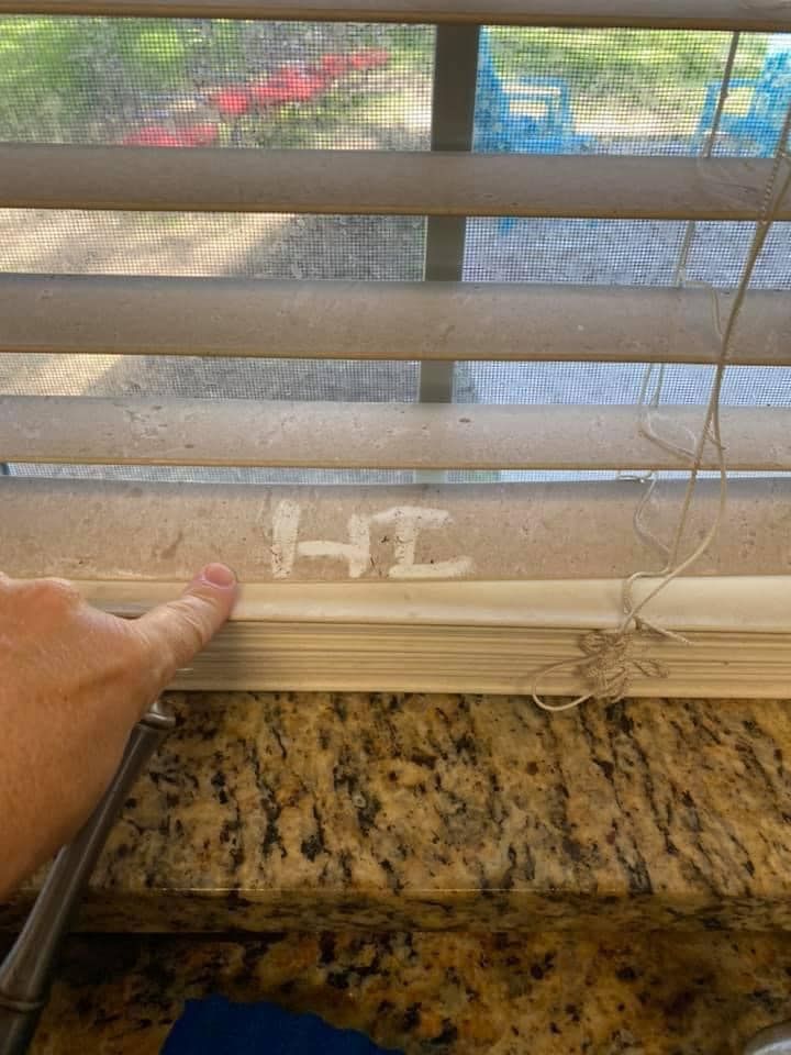 Hand Pointing At The Window — Summerville, SC — A Step Above N Beyond Cleaning Service Ltd. Co.