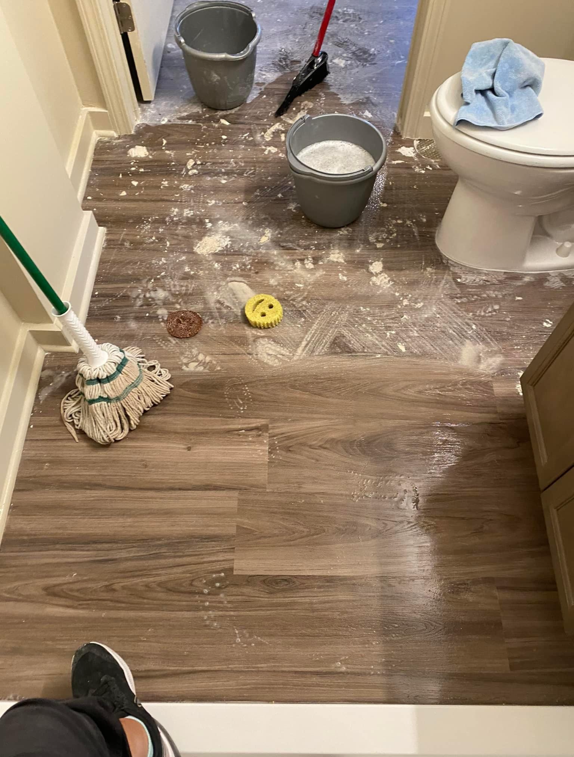 Cleaning A Bathroom With A Mop — Summerville, SC — A Step Above N Beyond Cleaning Service Ltd. Co.
