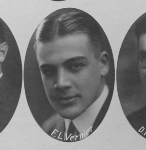 A black and white photo of a man with the name fl verrier