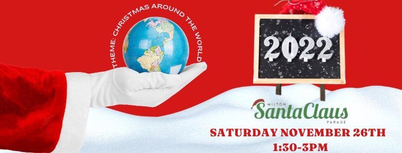Santa claus is holding a globe in his hand next to a sign that says 2022.