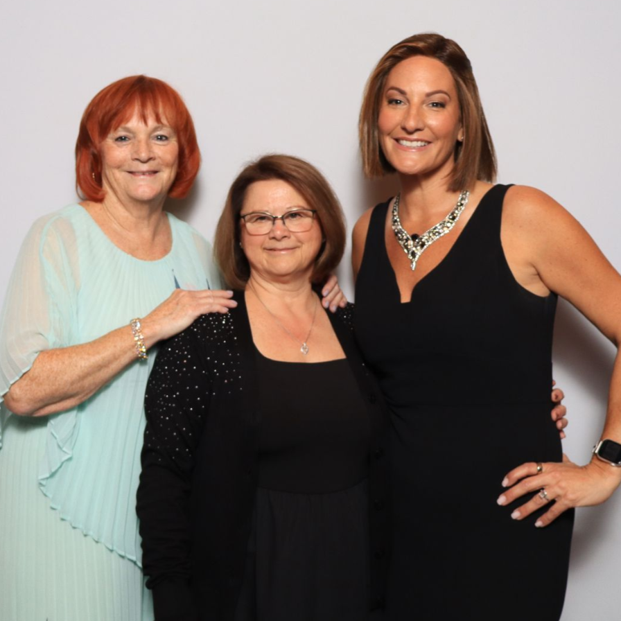 Amy Flowers with mom Jane Anne and aunt Flowers Team Real Estate 25 year anniversary gala October 2026