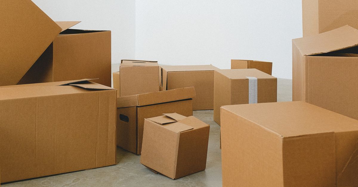 Moving boxes in a home being packed up after a divorce sale in Milton, Ontario