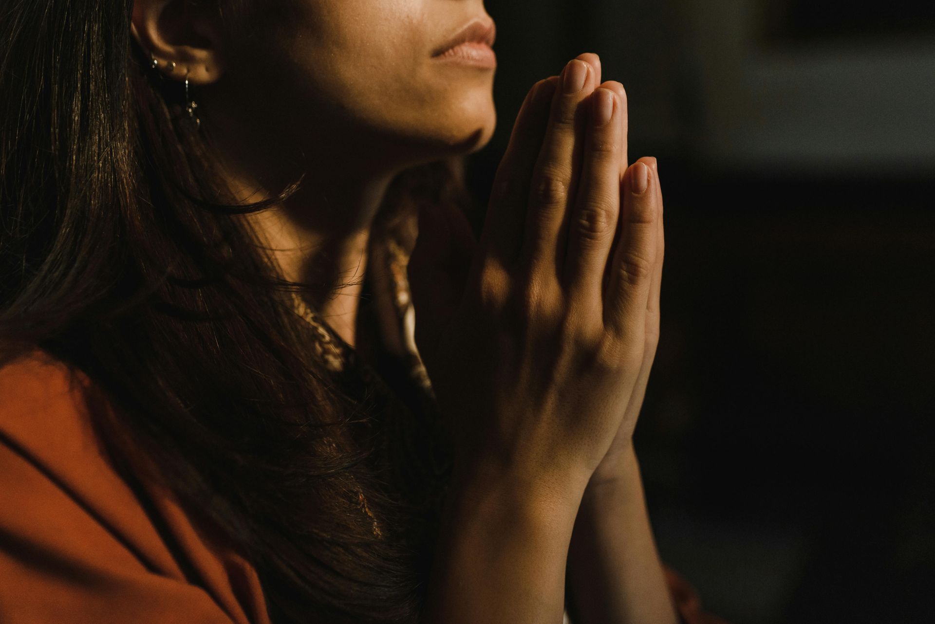 Woman in prayer position