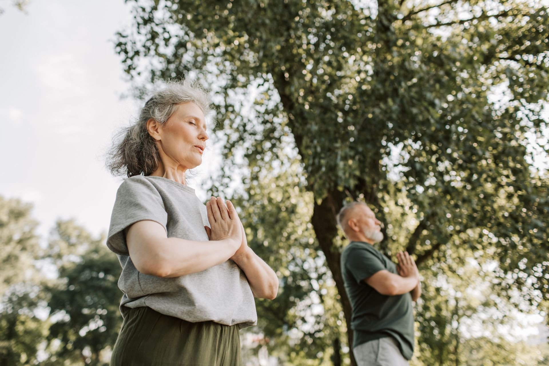 woman and man in meditation.