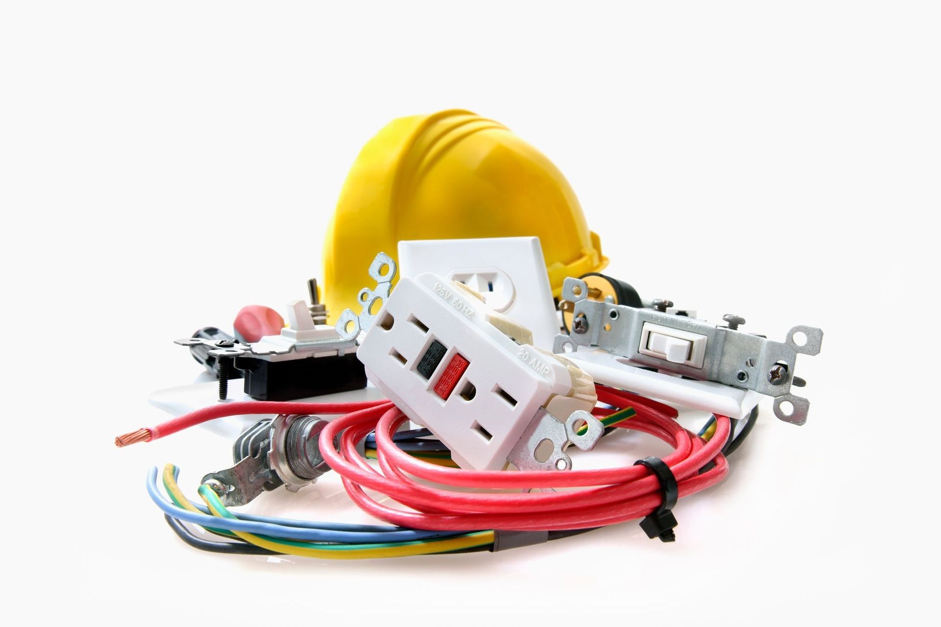 Yellow hard hat with electrical components and wires.
