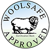 Woolsafe Approved logo with a black sheep in a white circle on a pale green background