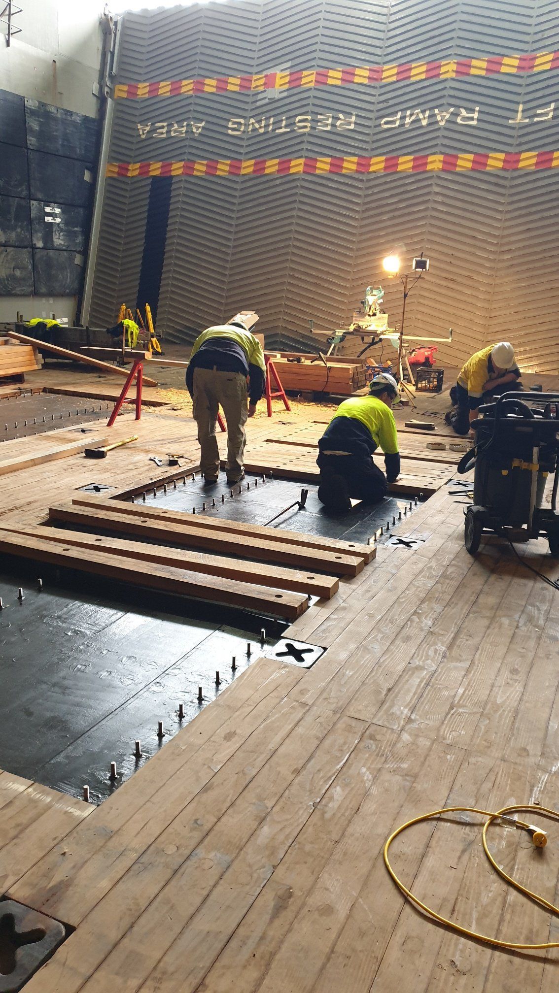 Workers Installing Woods on the Floor — Newcastle, NSW — Channel Shipwright Services