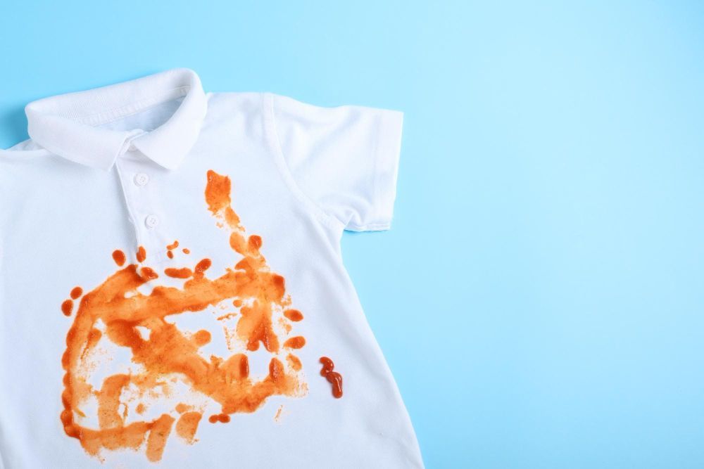How do you get tomato sauce stains out of clothes?