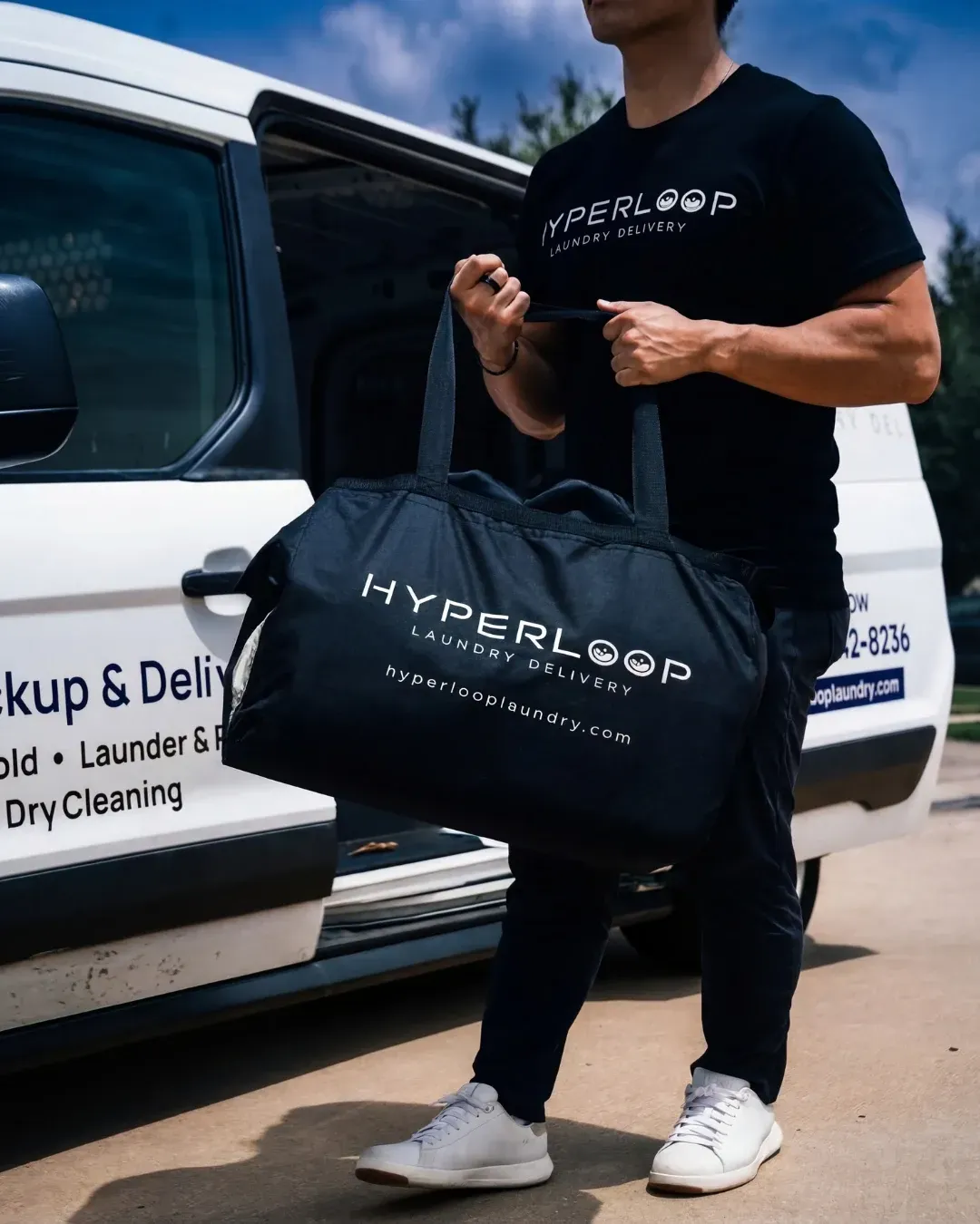 Hyperloop courier picking up a laundry bag