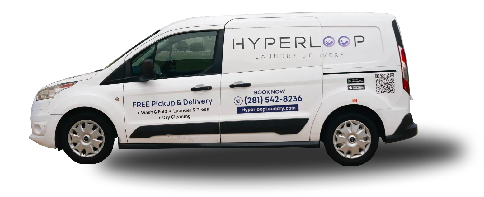 White Hyperloop van with logo and contact information on the side.