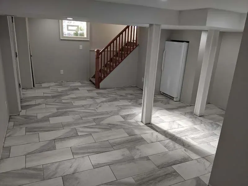 A finished basement in Dearborn, MI by Dream Builders Contracting