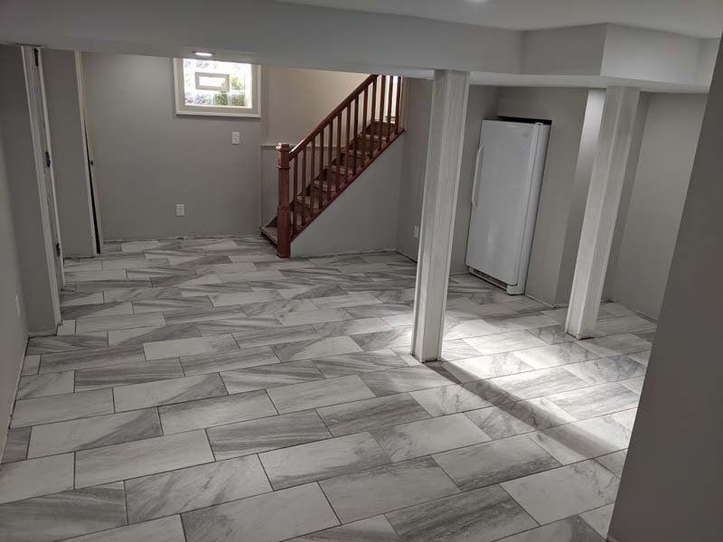 A finished basement in Dearborn, MI by Dream Builders Contracting 