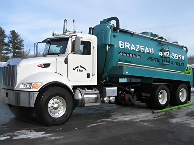 A septic tank and toilet truck Brazeau Sanitation