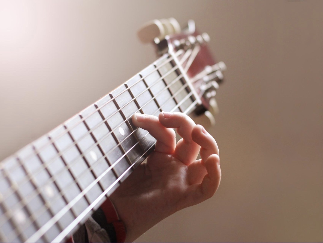 kid playing instrument