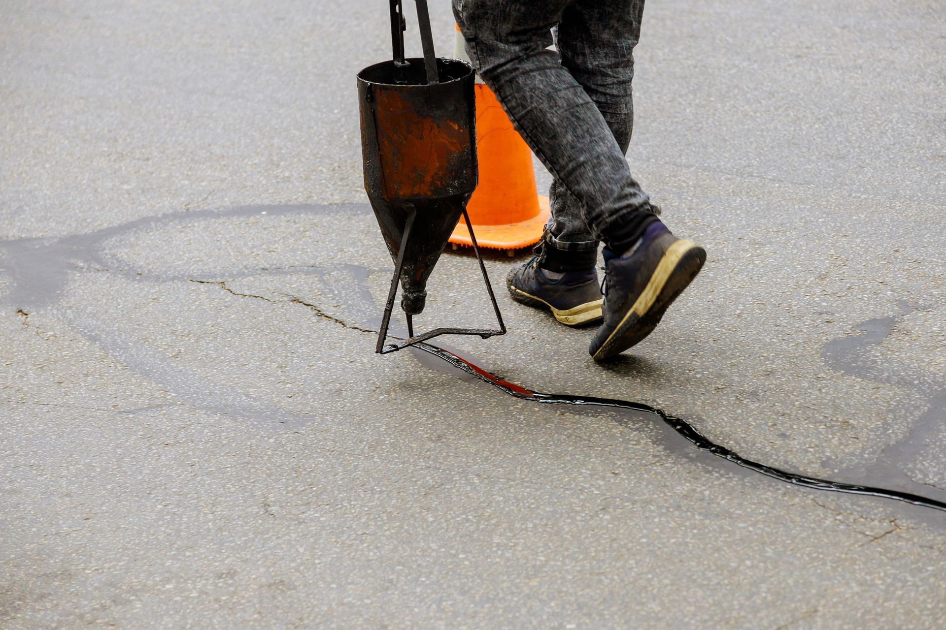 Sealing Joint Crack in Asphalt Road Surface Restoration Work — Sydney, Nsw — C & C Asphalt Pty Ltd