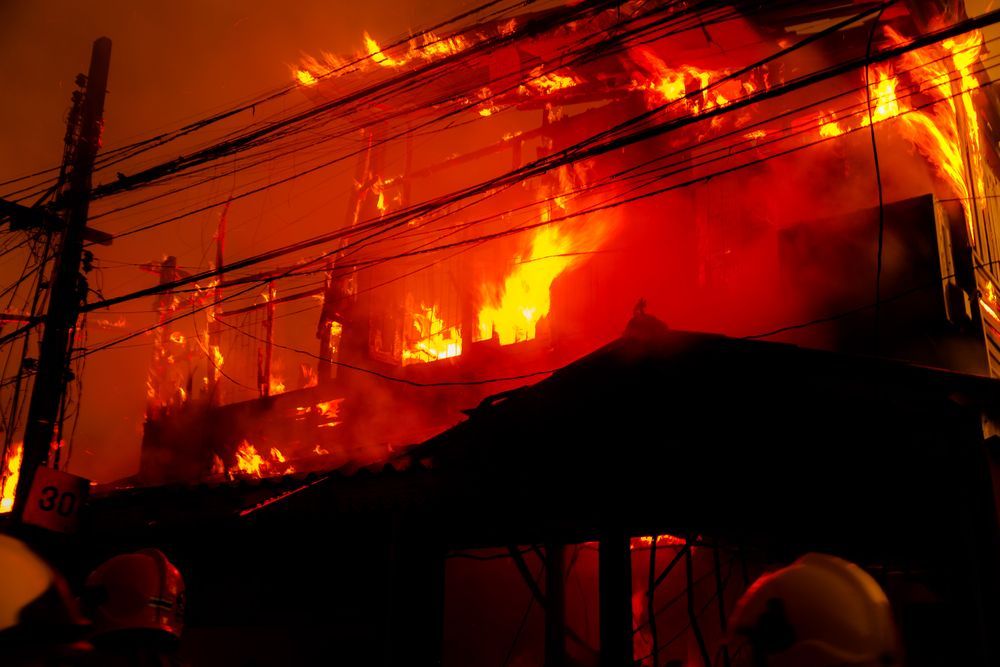 Building engulfed in flames — Phoenix Protective & Marine Coating Specialists in Woree, QLD