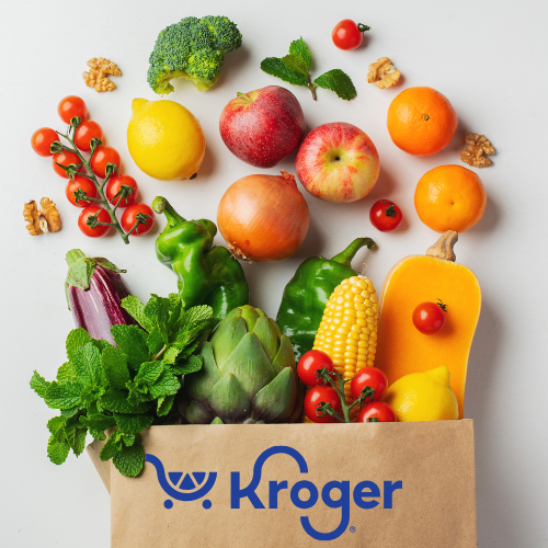 Kroger grocery bag overflowing with fresh produce: fruits, vegetables, and nuts on a white background.