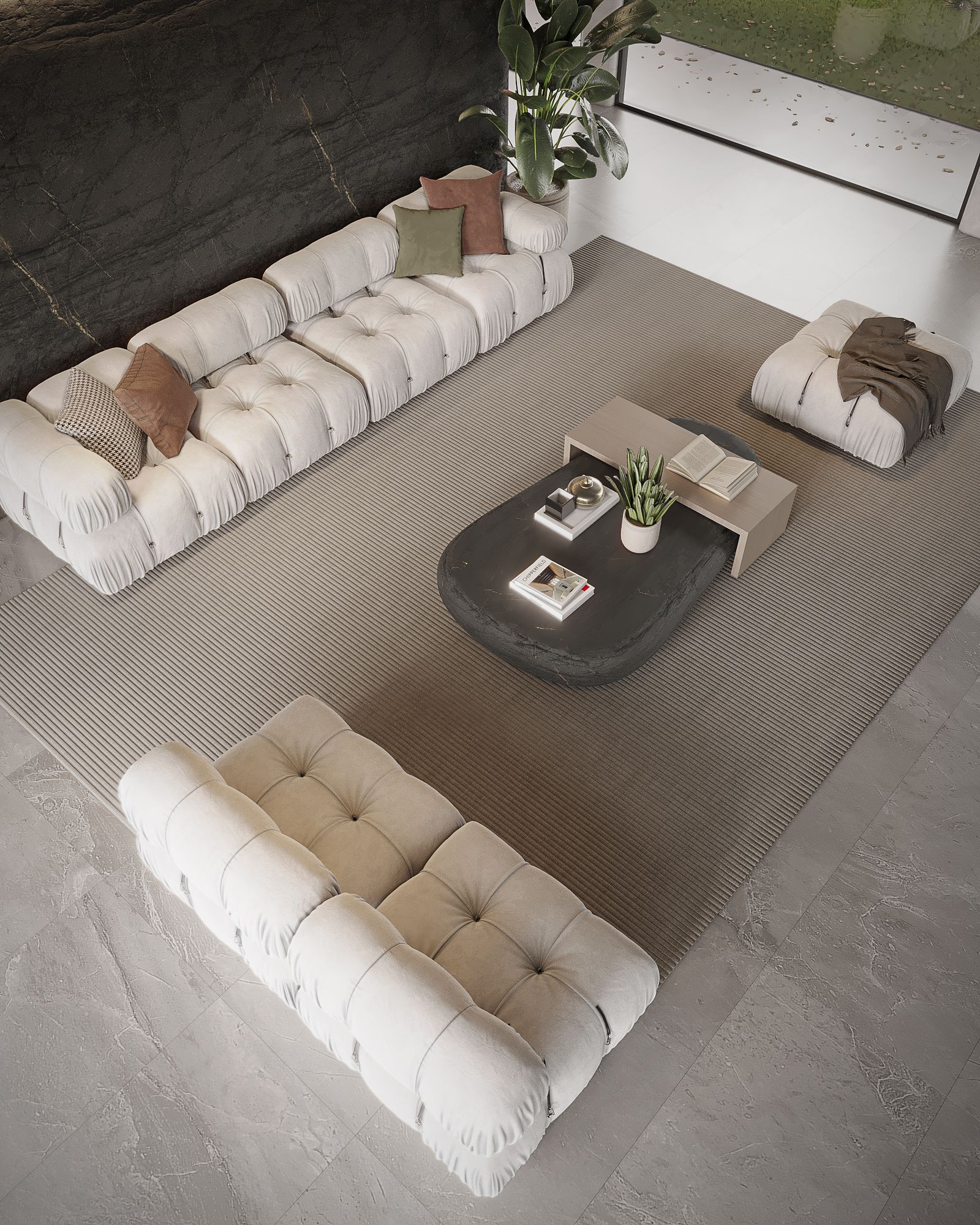 Beige tufted sofas, coffee table, and pouf on a rug in a modern living room.