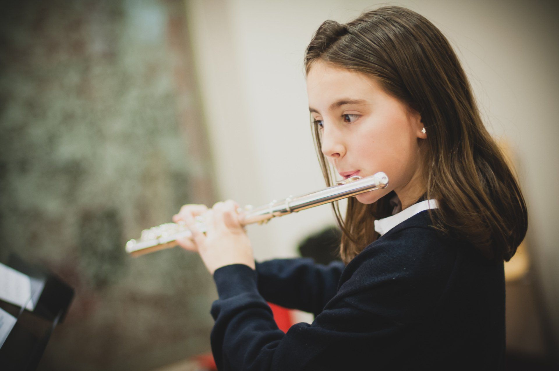 Girl Playing Flute — Los Alamitos, CA — Applied Music Studio Girl Playing Flute — Los Alamitos, CA — Applied Music Studio