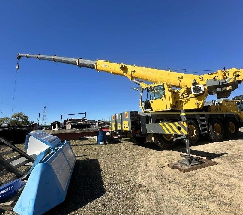 Yellow Crane on a Construction Site — Taree Crane Service in Taree, NSW