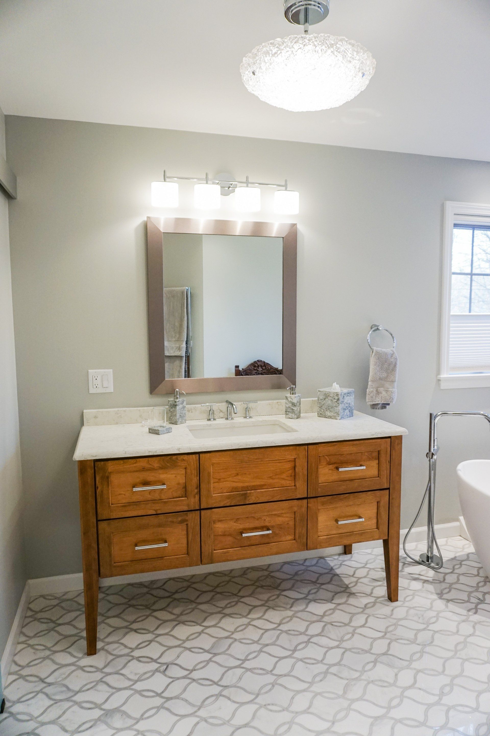 large bathroom remodel in Western MA featuring large tub, beautiful vanity and walk in shower