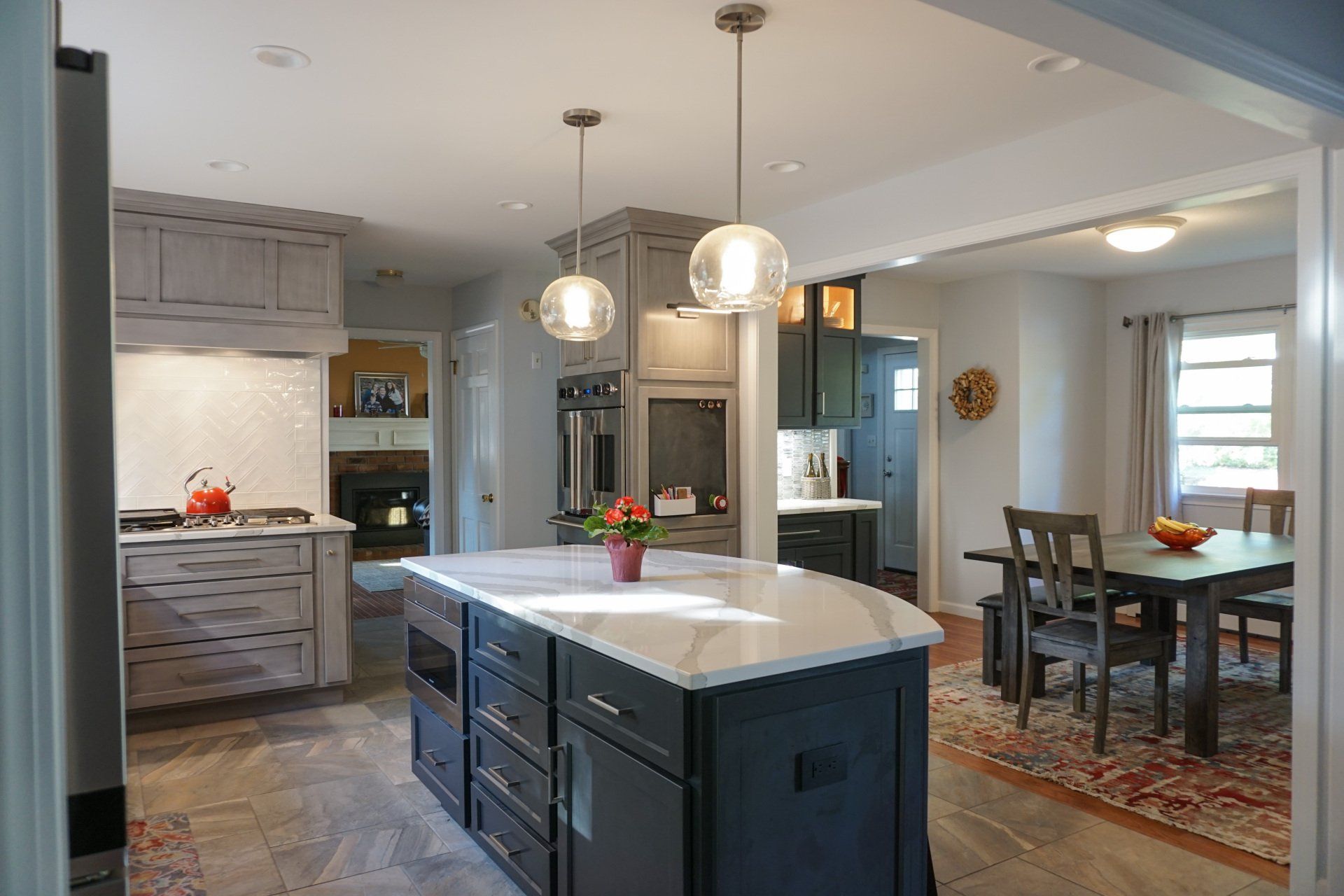 a kitchen with a large island in the middle