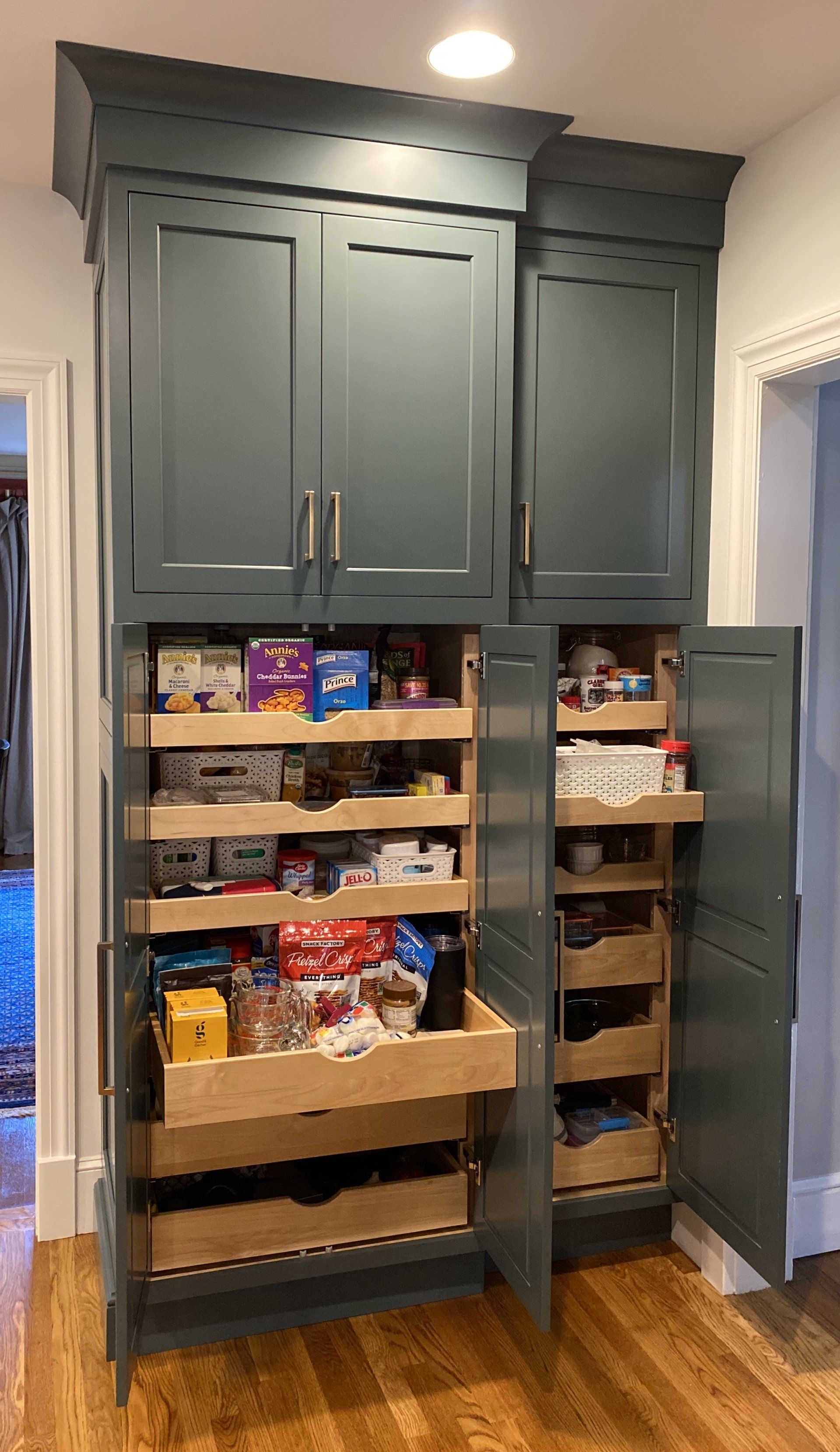 a kitchen pantry with drawers and cabinets  - updated kitchen remodel