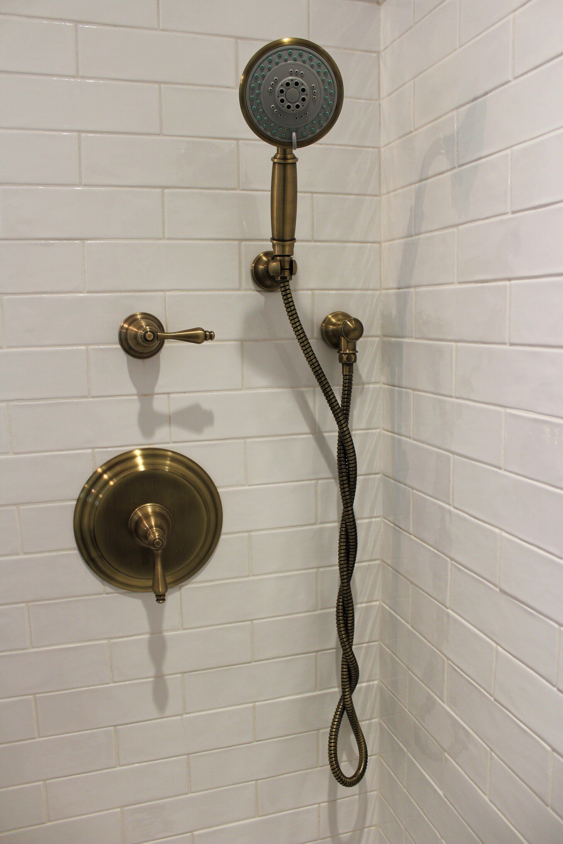 bronze style shower fixtures on new bathroom renovation in East Longmeadow