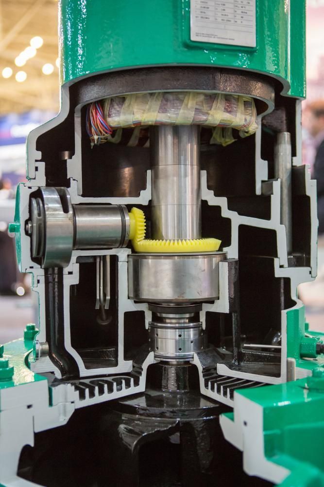 A Close Up Of A Machine Cut In Half Showing The Inside Of It — New England & North West Concrete Pumping In Uralla, NSW