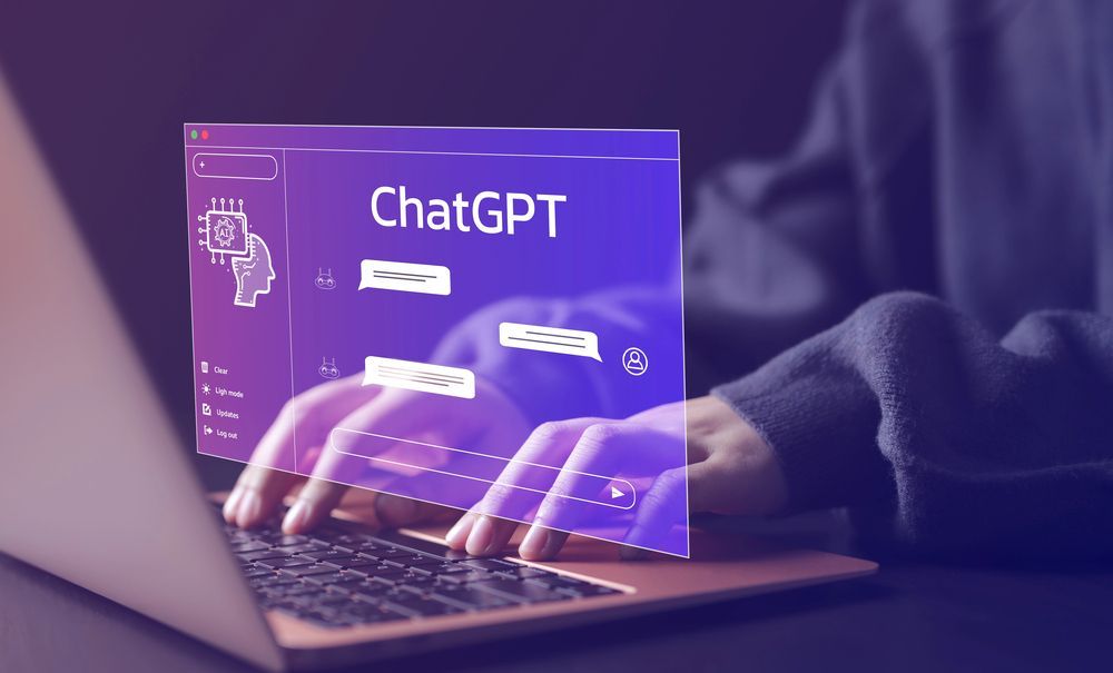 Person typing on laptop, overlaid with a glowing ChatGPT interface on a purple background.