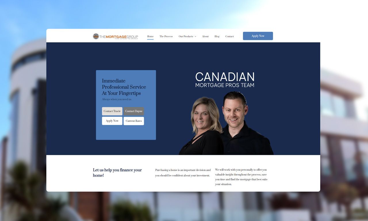 A man and a woman are standing in front of a building.