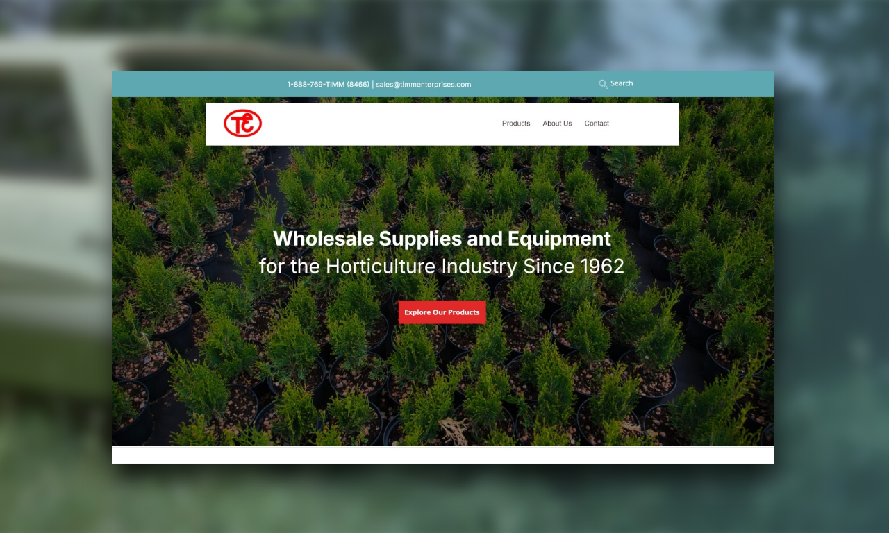 Website homepage for DK wholesale supplies and equipment, featuring a field of young trees.