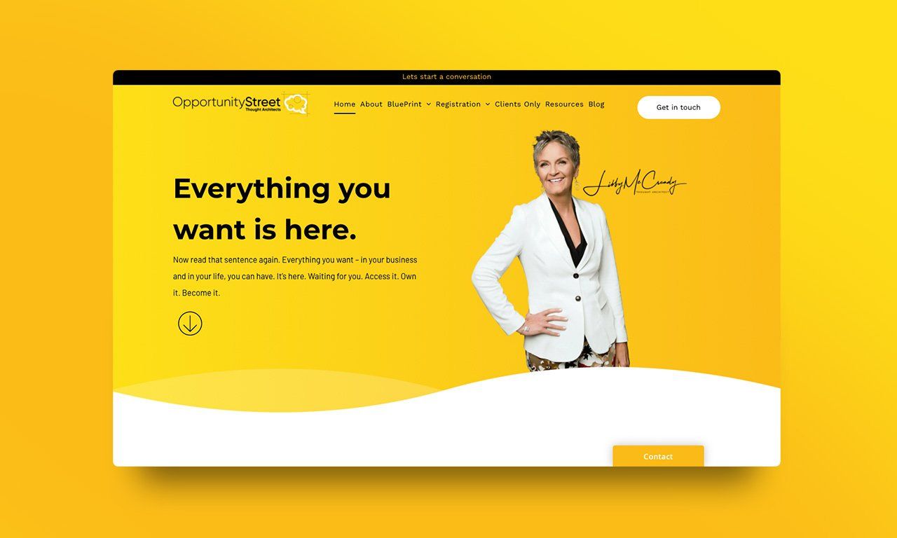 A woman is standing in front of a yellow background with the words `` everything you want is here ''.