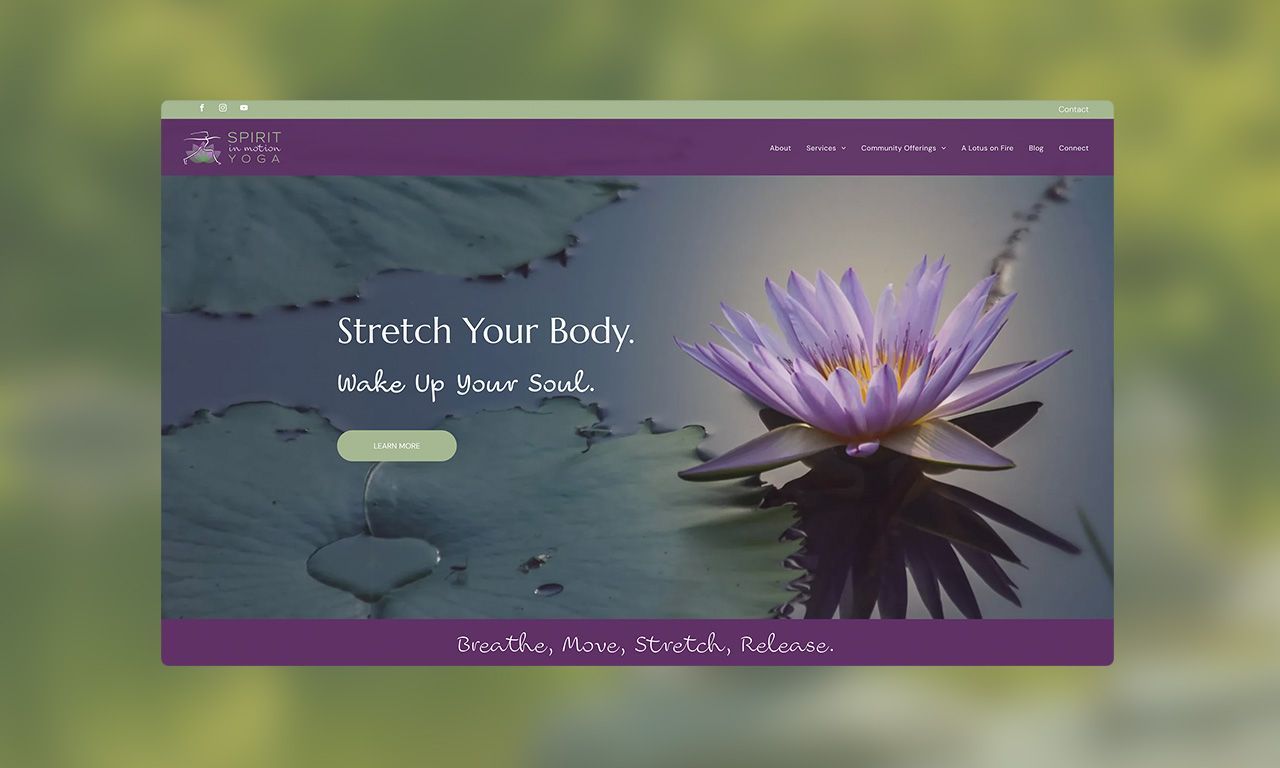 A computer screen with a purple flower on it.