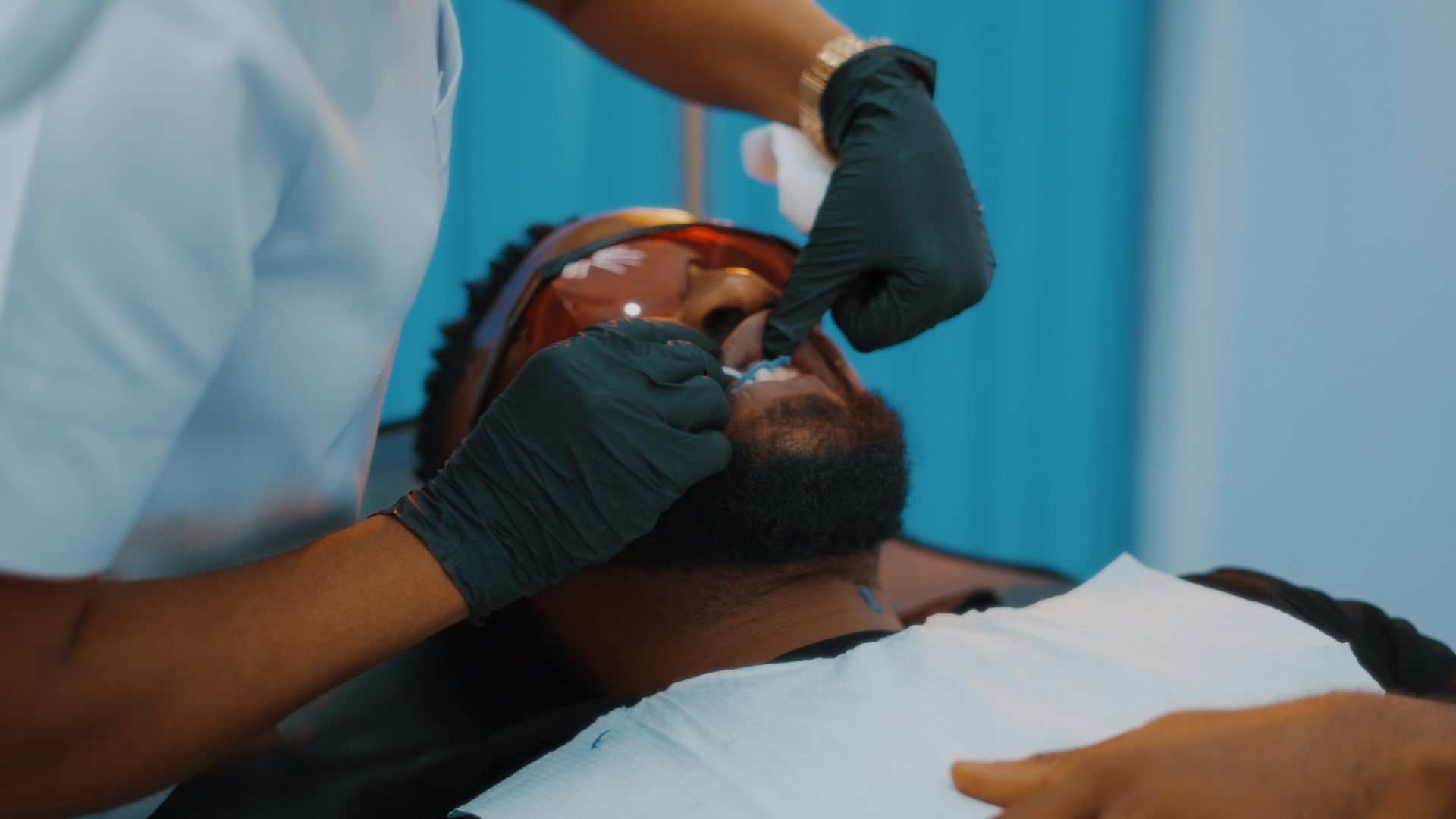 Patient receiving tooth bonding treatment at Robert A. Lantzy DMD, Cosmetic Bonding in Newtown, PA