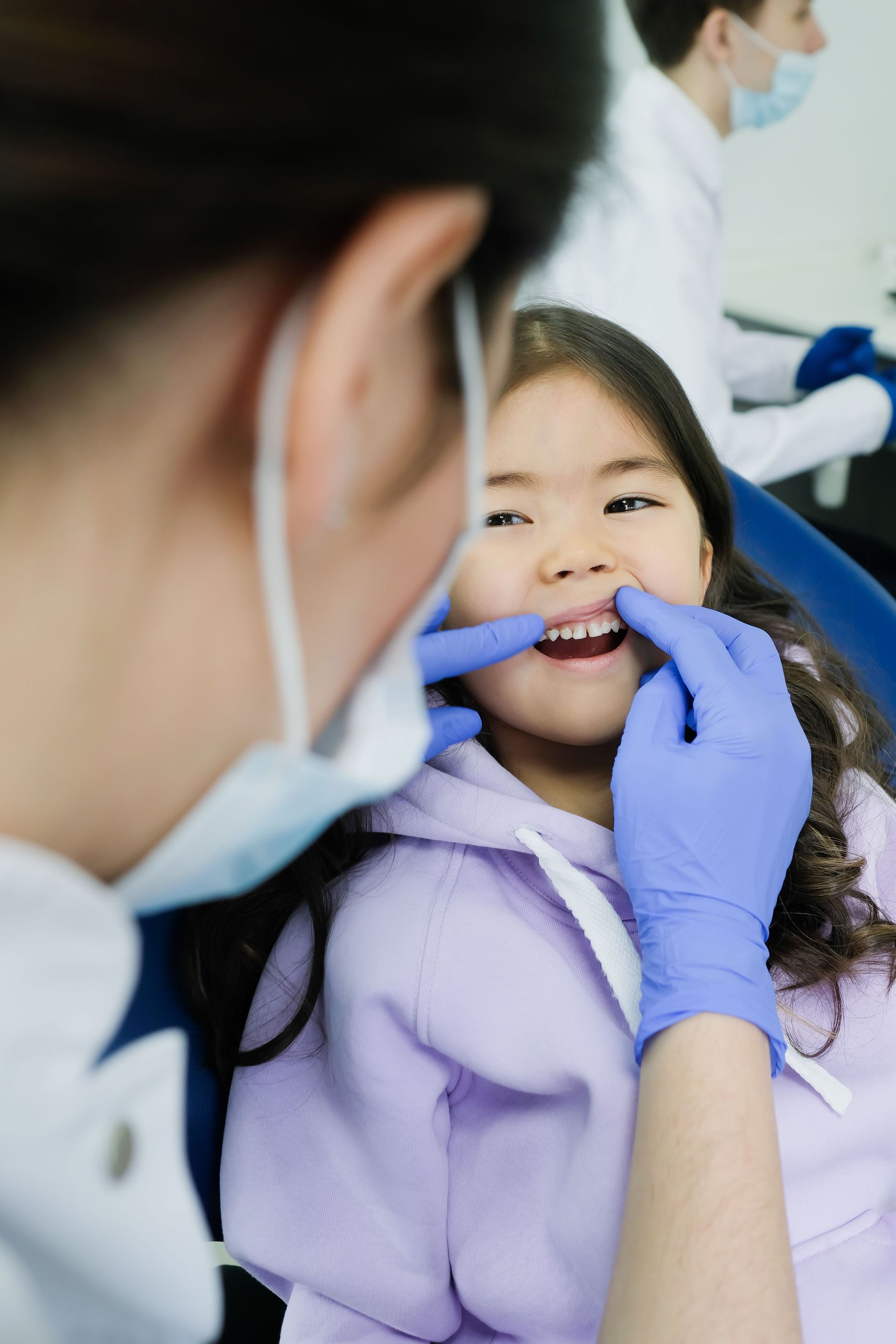 Dentist examining a child's lip tie at Robert A. Lantzy DMD, Lip Tie treatment in Newtown, PA