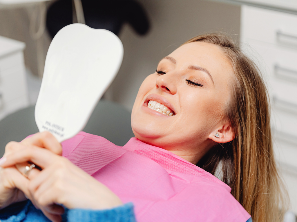 Patient viewing veneer results at Robert A. Lantzy DMD, Porcelain Veneers in Newtown, PA