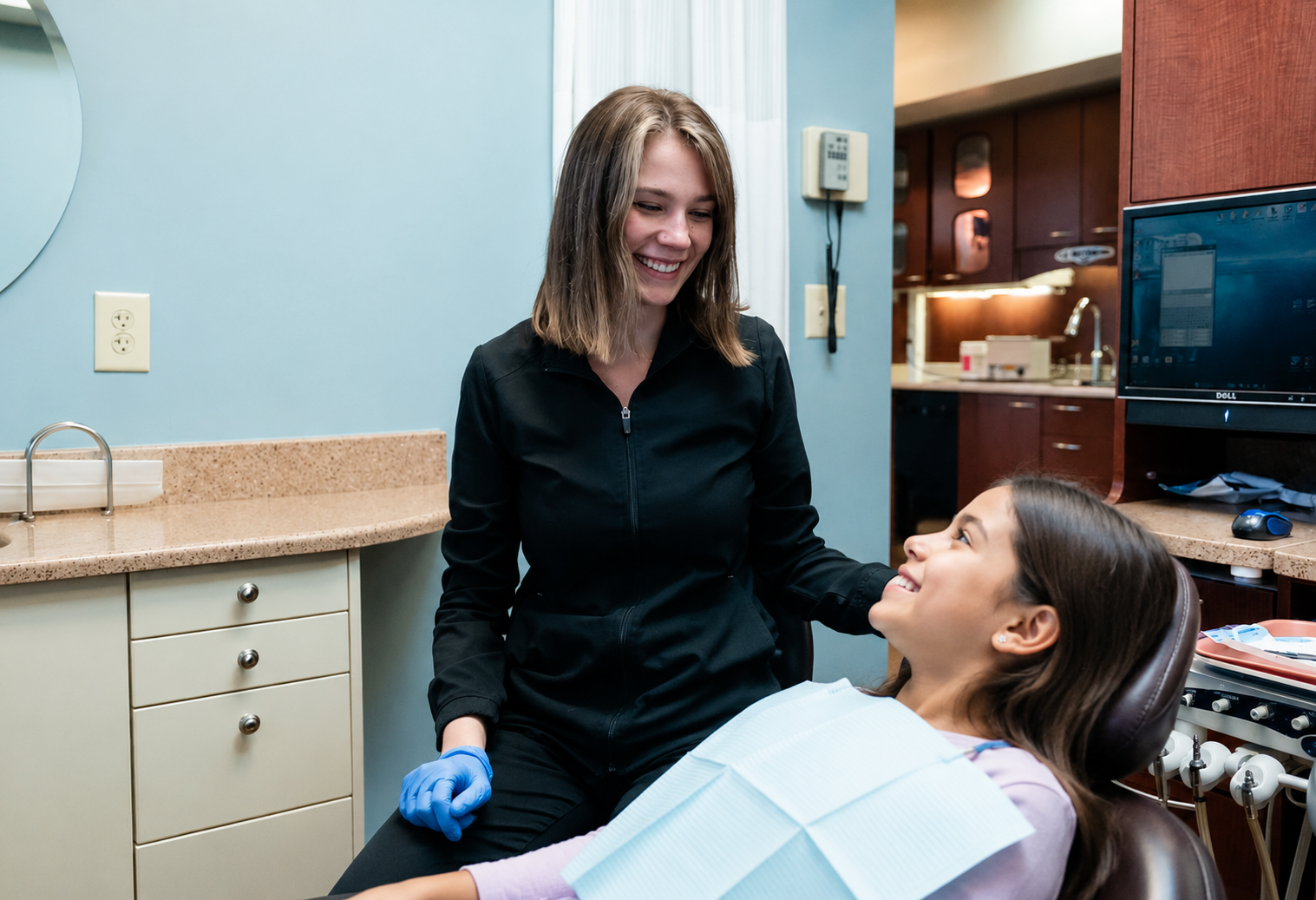 Dentist examining a child at Robert A. Lantzy DMD, Children's Dentistry in Newtown, PA