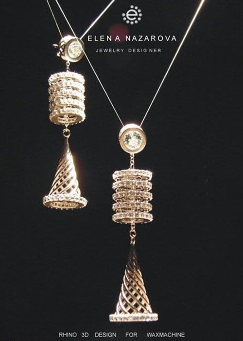 Gold Mesh Pendant Jewelry on Black Background at Robert A. Lantzy, DMD, LCC in Newtown, PA