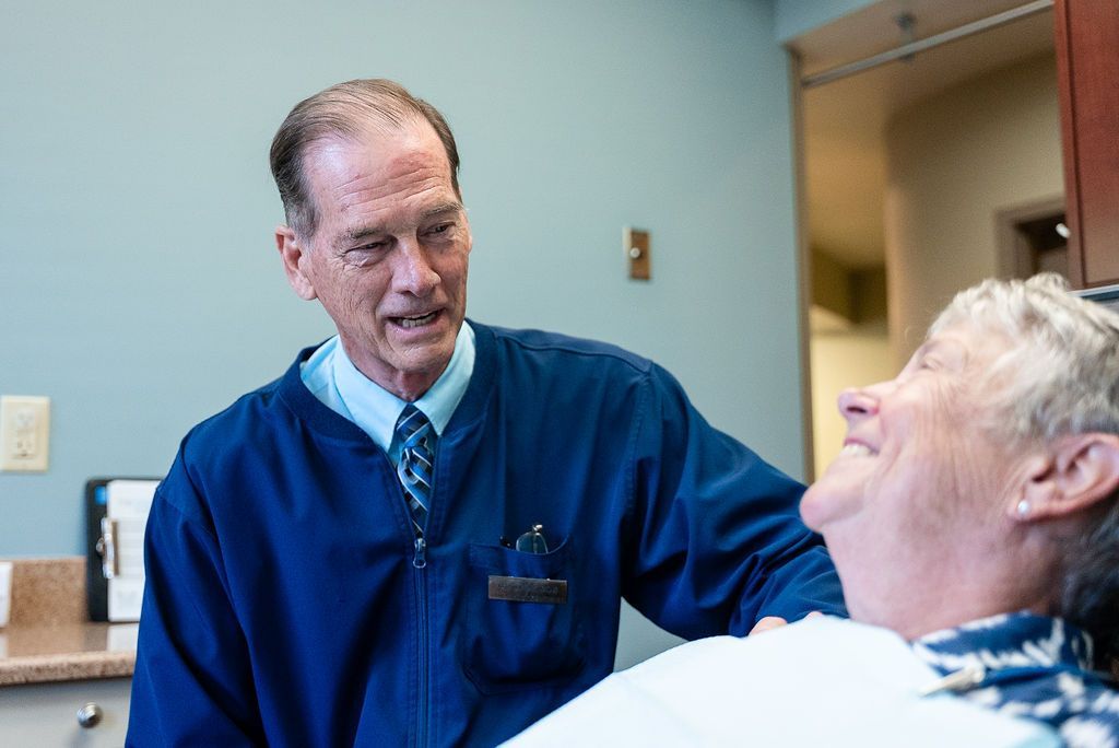 Doctor Bob with a patient in a clinic room at Robert A. Lantzy DMD, LLC in Newtown, PA