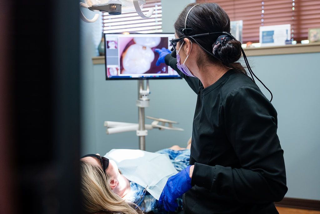 Dentist reviewing digital dental images at Robert A. Lantzy DMD, Oral-Systemic Health in Newtown, PA